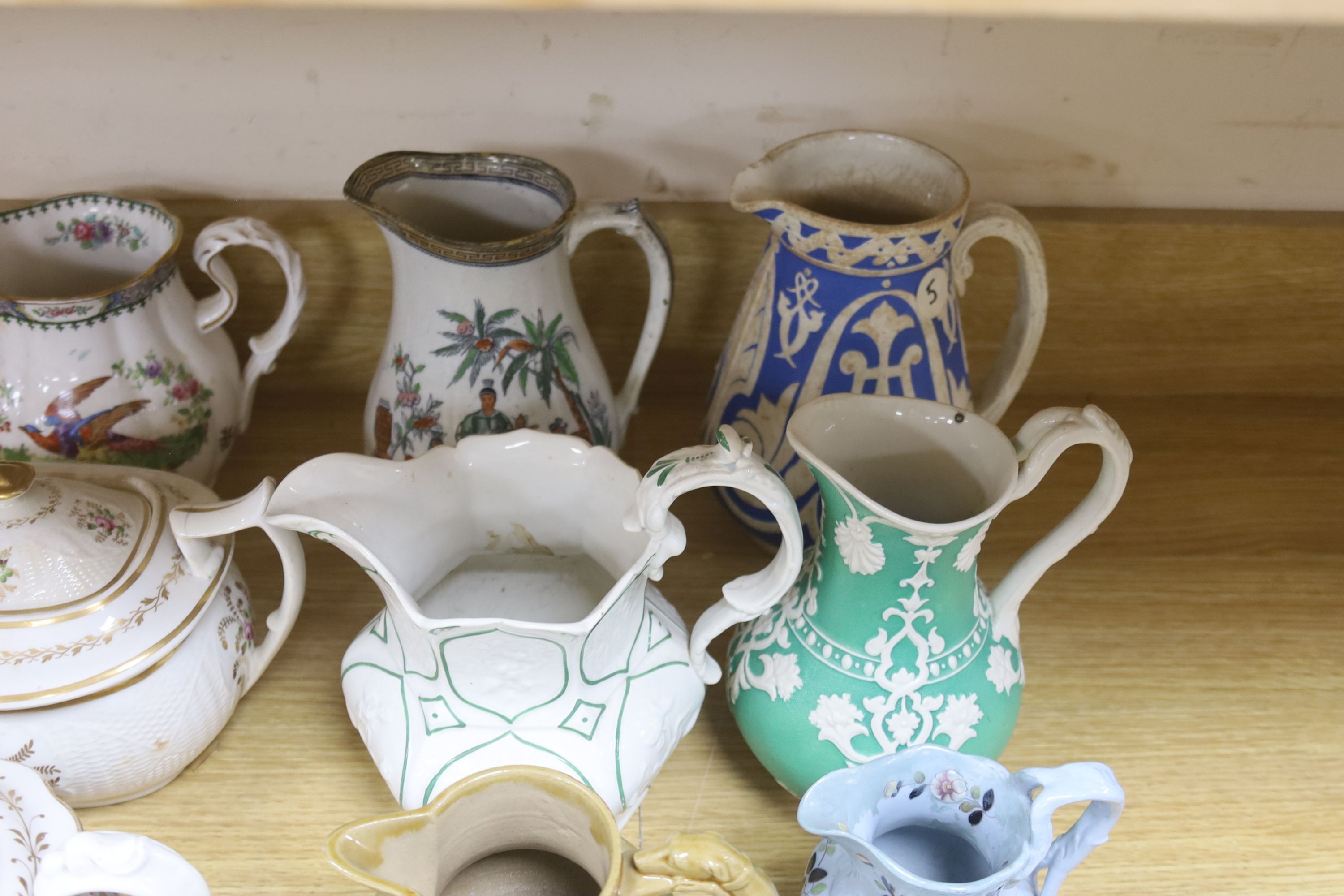 A group of mainly 19th century ceramics, teapots and jugs